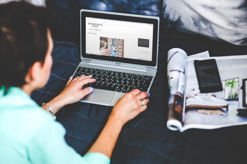 WordPress for Authors: Build a High-Converting Site | Woman using a laptop.